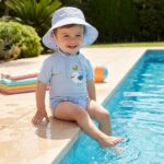 Gorro con protección solar 0-6 meses Navy Hugs - Imagen 7